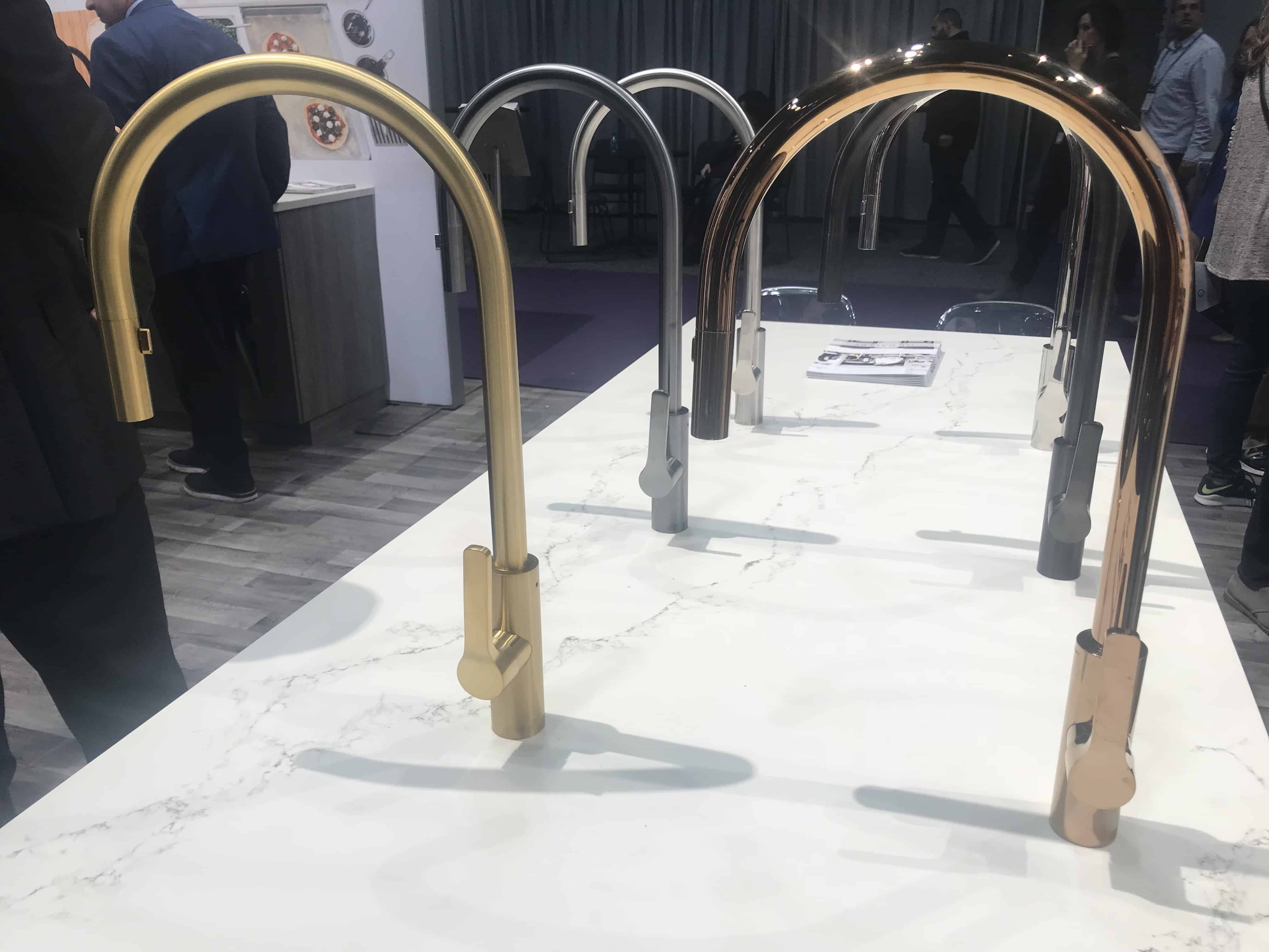 Rose Gold Faucet sits in the mix of brushed Gold, chrome and other finishes at the Kohler booth