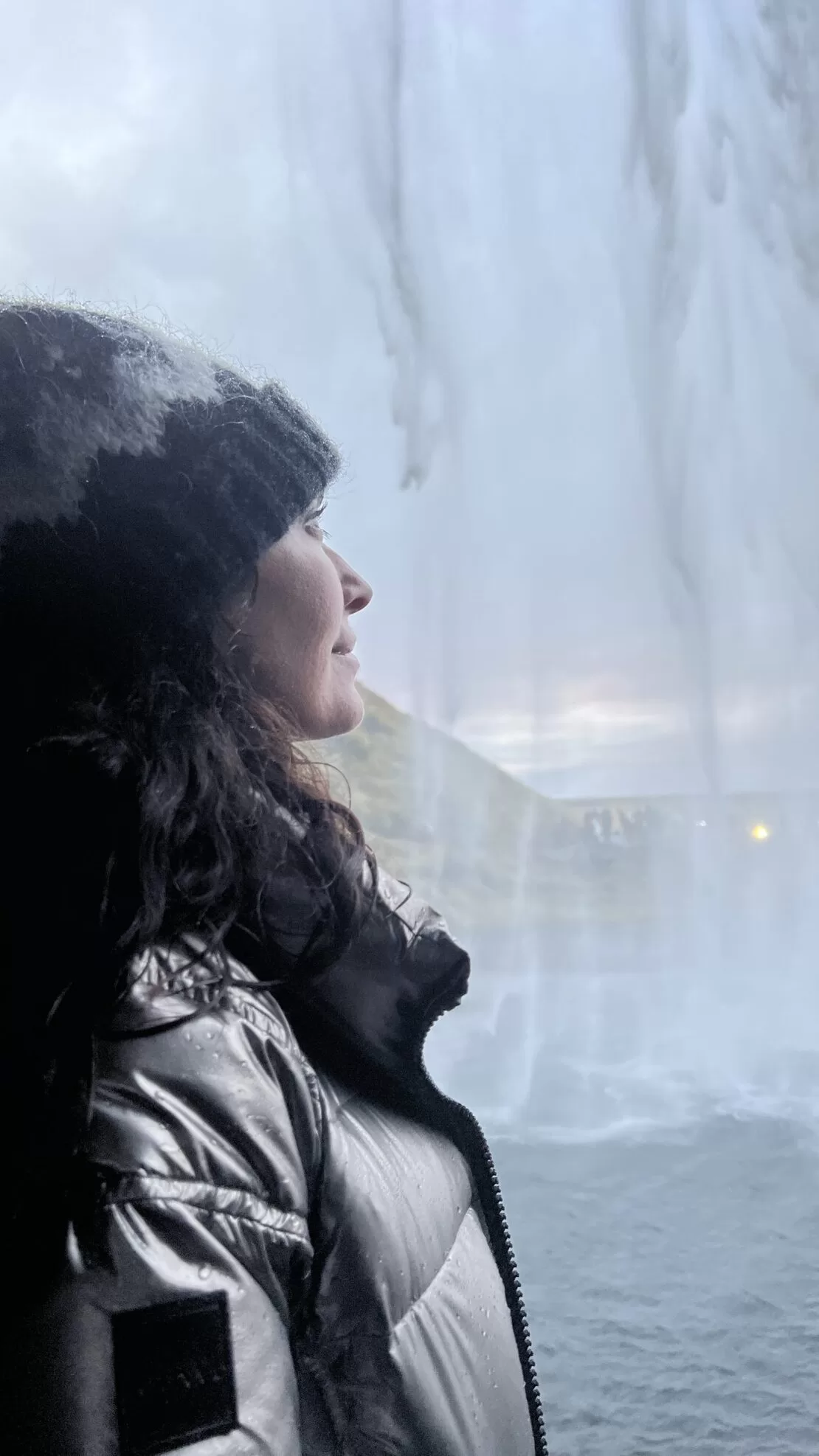 Karen LeBlanc looking out a waterfall