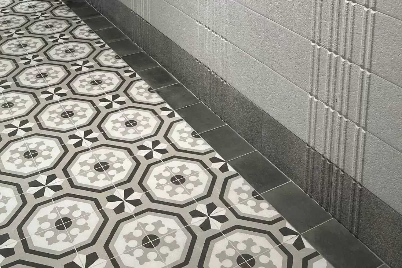 hydraulic styled tile on floor